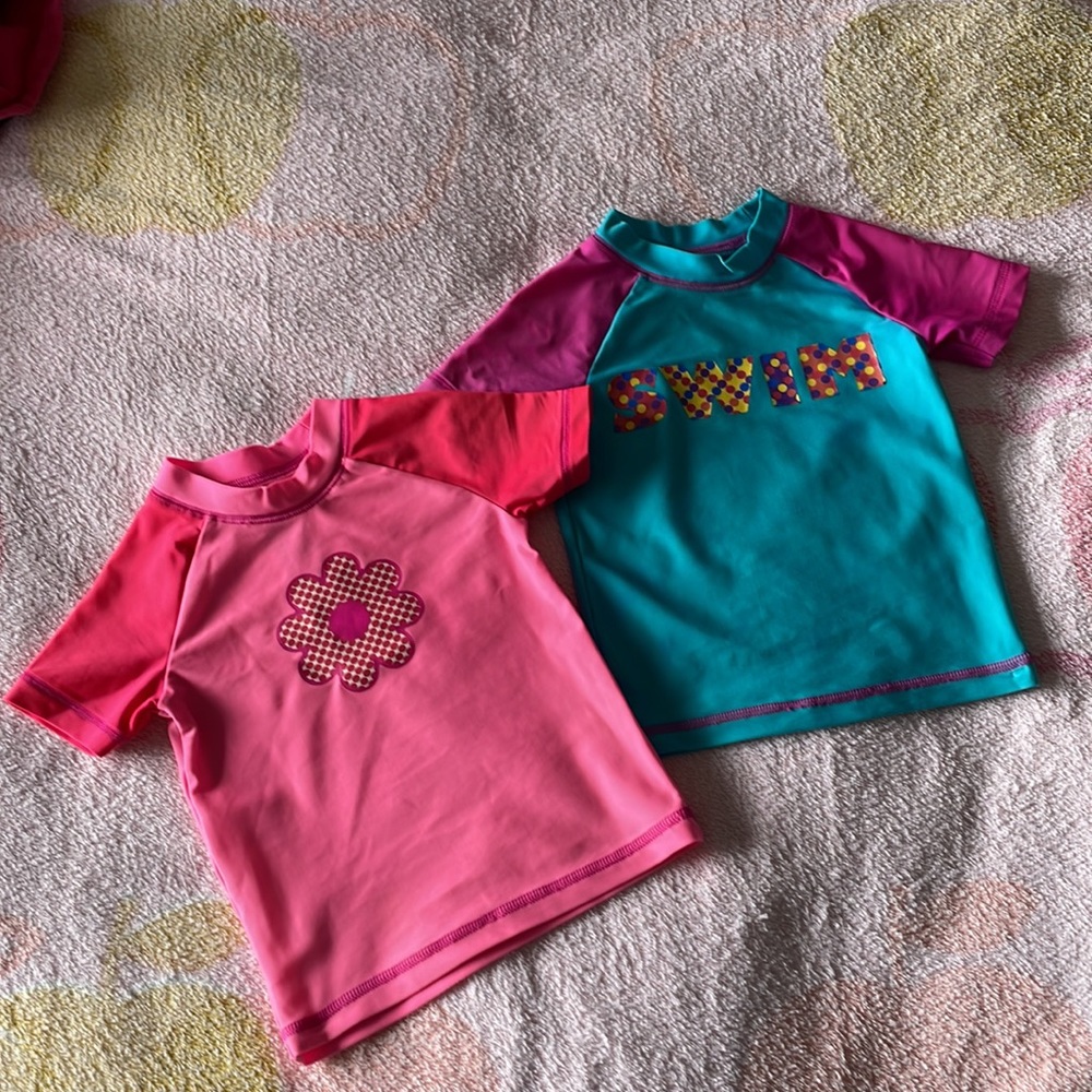 Two swim shirts
